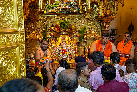 People offer prayers at Siddhivinayak Temple on the occasion of 'Angarki Chaturthi' festival, in Mumbai, Maharashtra.
