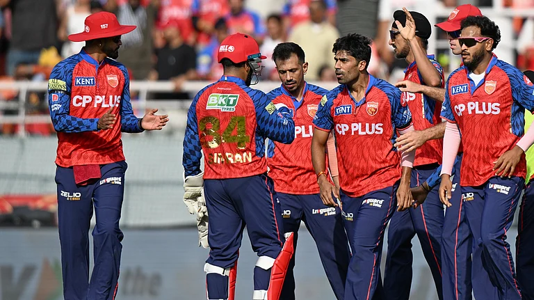 Shashank Singh celebrating with teammates after dismissing Abhishek Sharma during PBKS vs SRH IPL 2026 match at Mullanpur. - AP Photo