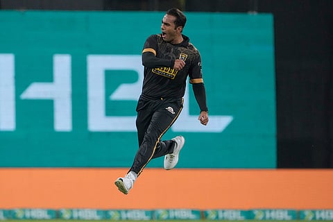 Hyderabad Kingsmen's Mohammad Ali celebrates after the dismissal of Peshawar Zalmi's Babar Azam during the Pakistan Super League final cricket match between Peshawar Zalmi and Hyderabad Kingsmen, in Lahore, Pakistan.
