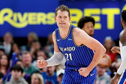 Orlando Magic forward Moritz Wagner (21) pumps his fists after scoring against the Detroit Pistons during the first half in Game 7 of a first-round NBA basketball playoffs series in Detroit.