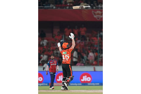 Sunrisers Hyderabad's Heinrich Klaasen tosses his bat after playing a shot during the Indian Premier League cricket match between Sunrisers Hyderabad and Punjab Kings in Hyderabad, India.