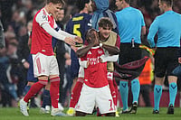 | Photo: AP/Alastair Grant : Arsenal's Bukayo Saka kneels on the ground celebrating at the the end of a Champions League semifinal, second leg, soccer match between Arsenal FC and Atletico Madrid in London, Tuesday, May 5, 2026. 