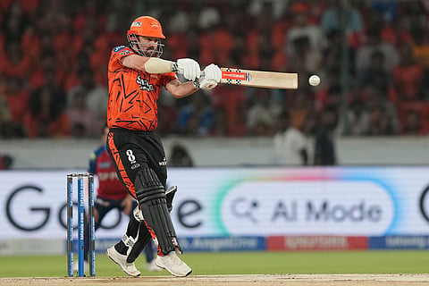 Sunrisers Hyderabad's Travis Head plays a shot during the Indian Premier League cricket match between Sunrisers Hyderabad and Punjab Kings in Hyderabad, India.