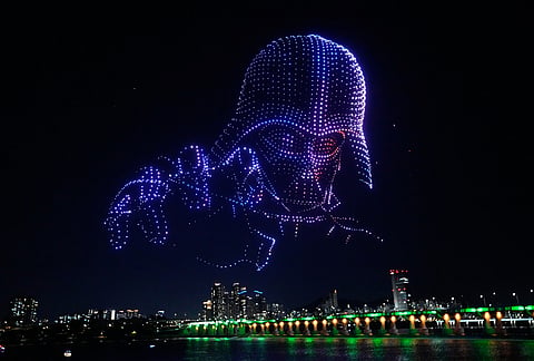 Star Wars themed drones show in the night sky to celebrate Star Wars Day at a park along the Han River in Seoul, South Korea.