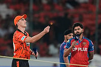 | Photo: AP/Mahesh Kumar A. : Sunrisers Hyderabad's Pat Cummins tosses a coin as Punjab Kings' captain Shreyas Iyer watches before the Indian Premier League cricket match between Sunrisers Hyderabad and Punjab Kings in Hyderabad, India.