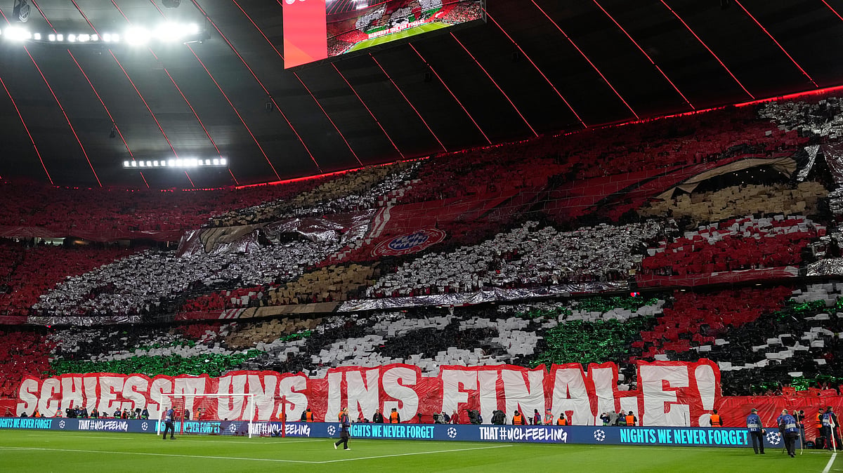 Bayern fans cheer prior the Champions League semifinal second leg soccer match between Bayern Munich and Paris Saint Germain in Munich, Germany. - AP Photo