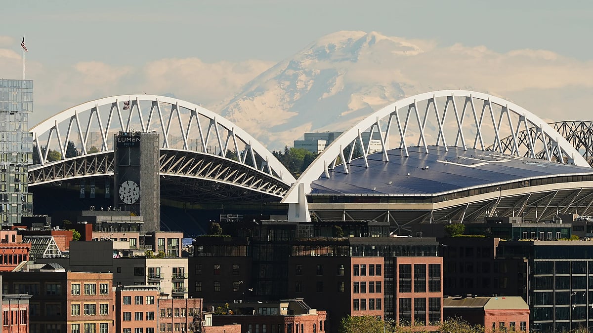 Mount Rainier is seen in the distance overlooking Lumen Field as seen from Pike Place Market, Saturday, April 25, 2026, in Seattle. - | Photo: AP/Lindsey Wasson