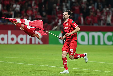 Antonio Briseno of Mexico's Toluca celebrates after beating the United States' Los Angeles FC during a CONCACAF Champions Cup second leg semifinal soccer match in Toluca, Mexico.