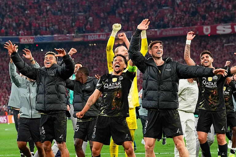 PSG players celebrate after the Champions League semifinal second leg soccer match between Bayern Munich and Paris Saint Germain in Munich, Germany. - | Photo: AP/Martin Meissner
