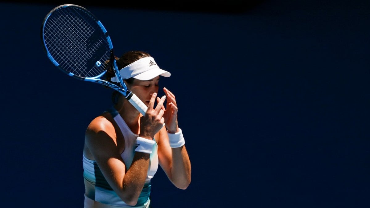 Garbine Muguruza reacts after losing a point to Alize Cornet in Australian Open 2022. 