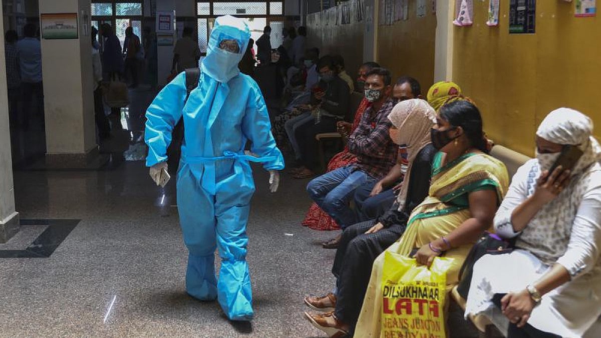 An woman in PPT suit walks towards a Covid-19 hospital ward in Hyderabad.(File photo)