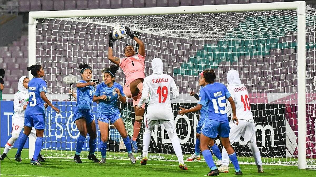 India's Aditi Chauhan makes a save against Iran in AFC Women's Asian Cup 2022.