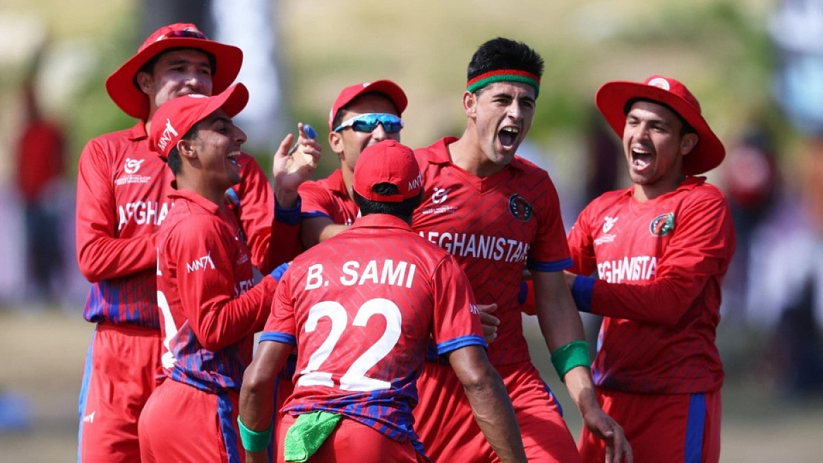 Afghanistan players celebrate the fall of a Sri Lankan wicket at the ICC U-19 Men's World Cup 2022. 