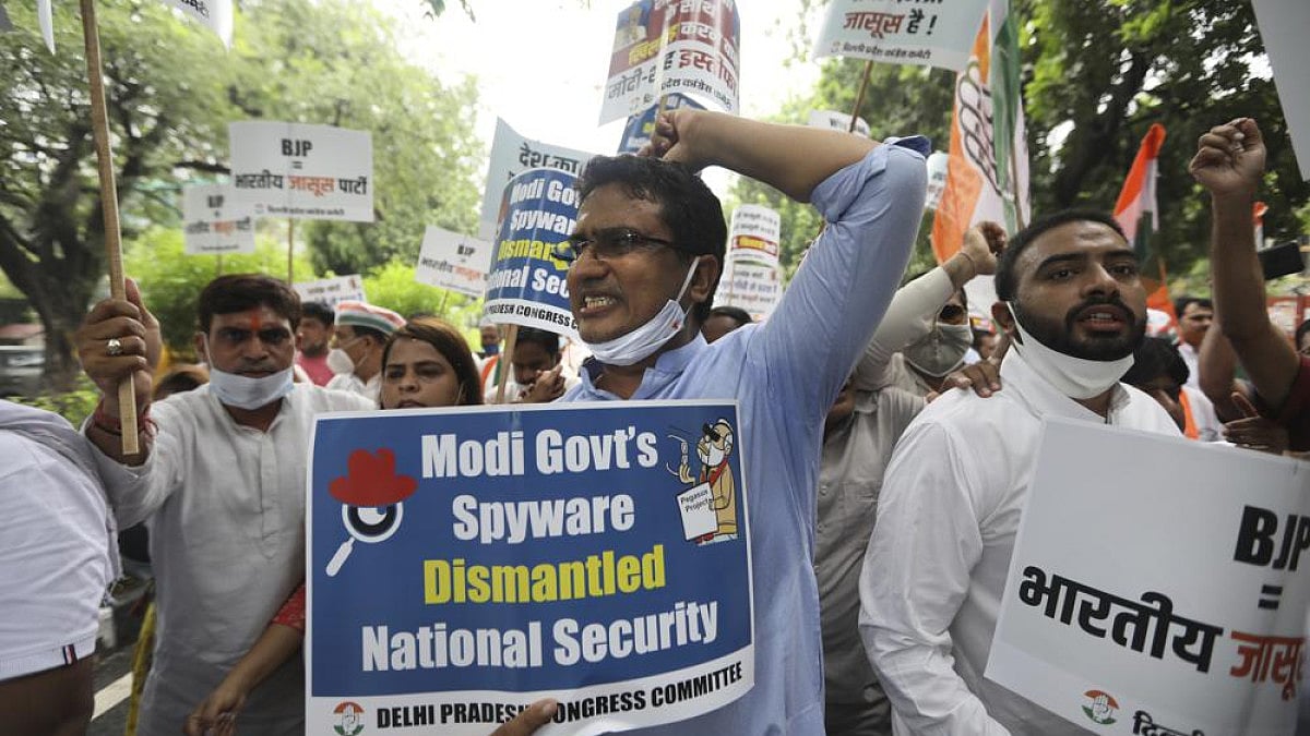 Congress party workers during a protest against PM Modi's government of using Pegasus spyware.