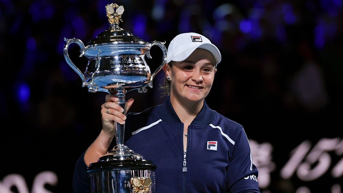 Ashleigh Barty holds Australian Open 2022 trophy after defeating Danielle Collins in the final. 
