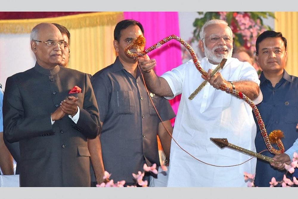PM Modi Inadvertently 'Does A Ram Act' By Breaking Bow At Dussehra Event