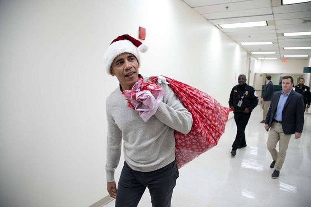 Barack Obama Dons Santa Hat, Visits Kids In Hospital With Gifts