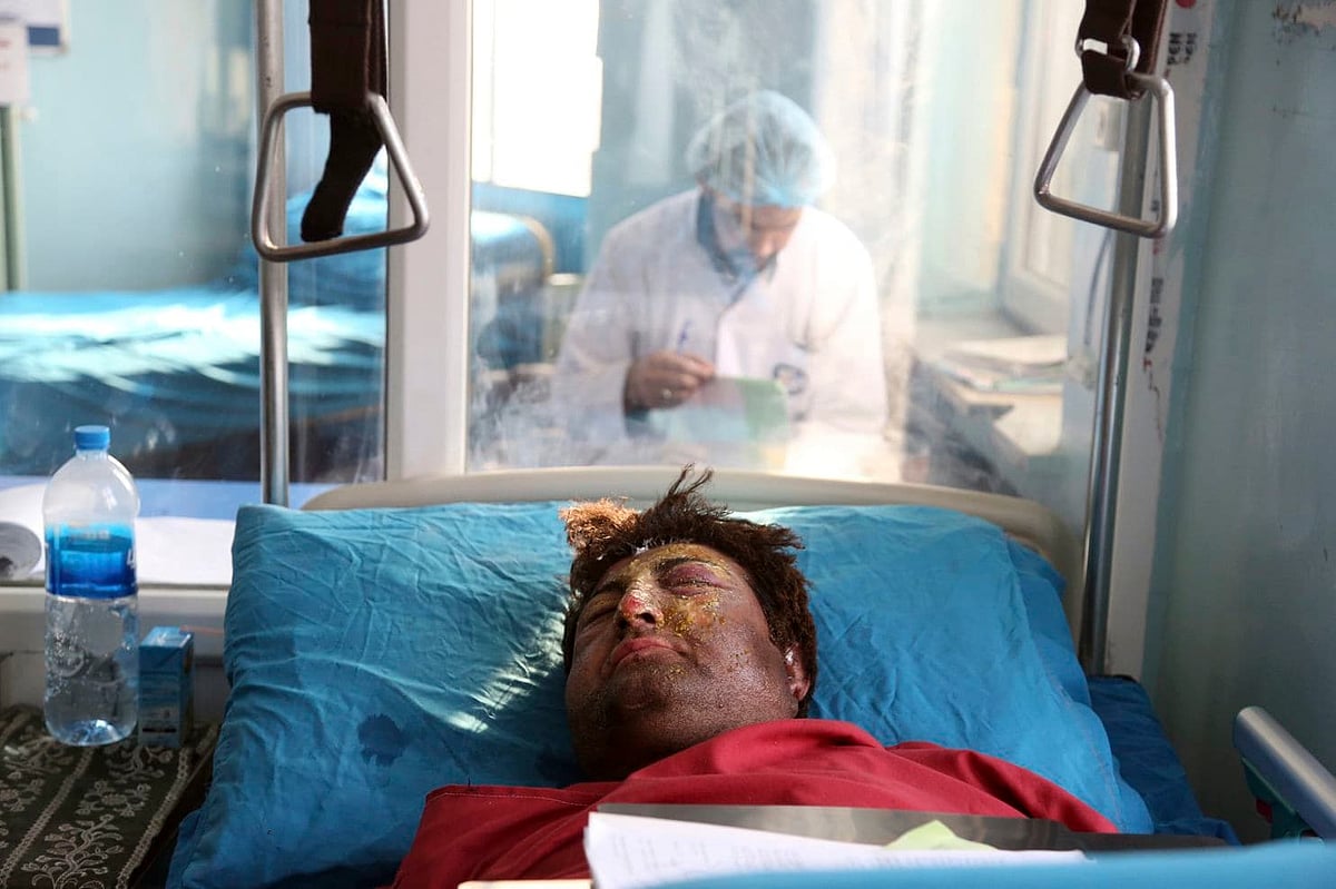 Afghan Government Office Attack Toll Climbs To 48