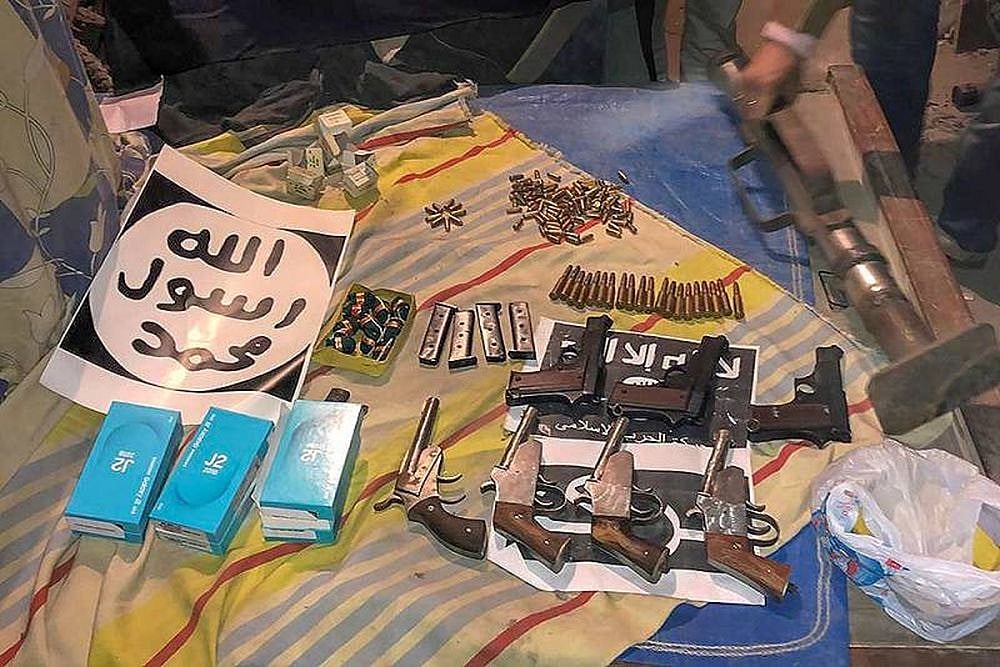 Several weapons and a cache of ammunition which were recovered by the National Investigation Agency (NIA) during its raids at 17 locations across Meerut, Lucknow, Hapur, Amroha and Seelampur in connection with its probe into a new Islamic State-inspired module, ‘Harkat ul Harb e Islam’, in New Delhi on Wednesday.