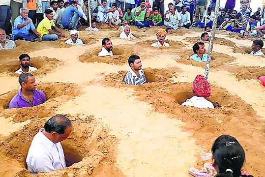 Farmers Bury Themselves In Pits To Protest Against Land Acquisition In Rajasthan