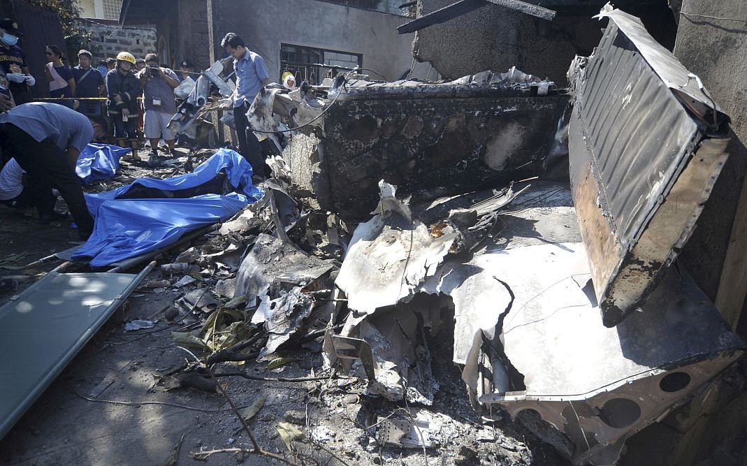 Ten Dead As Philippine Plane Crashes Into House