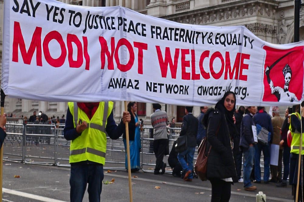 Angry Protesters Greet Modi With 'No Welcome' Sign On The First Day Of His UK Visit