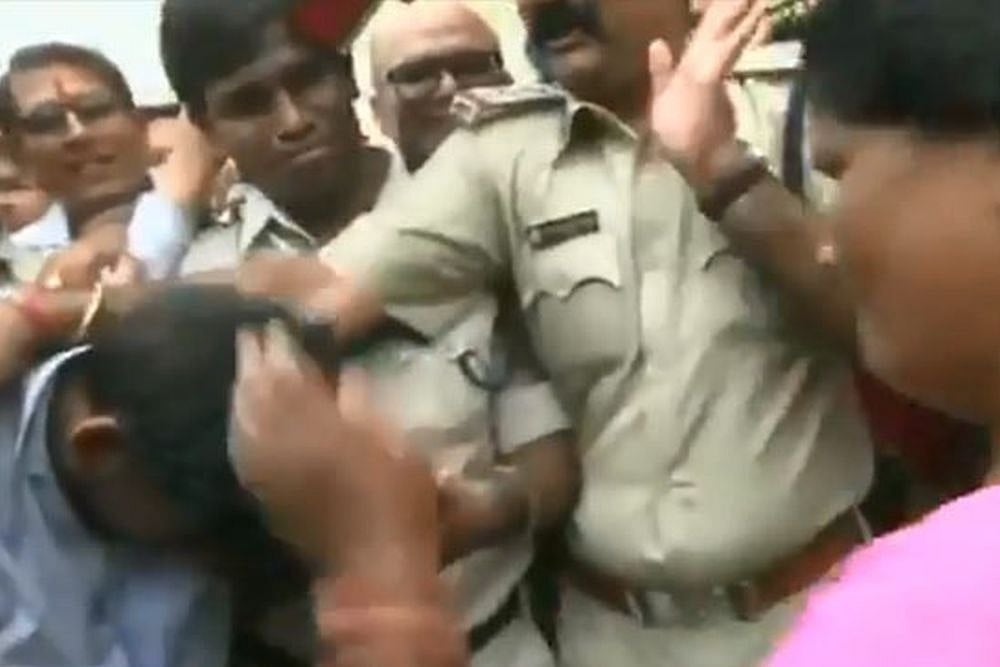Video: Bhopal Hostage Crisis Accused Paraded By Police; Women Assault Him With Slippers