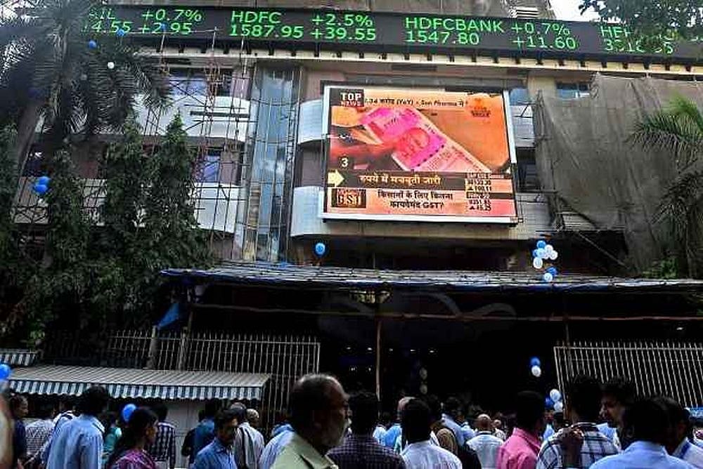 Sensex Falls Over 200 Points On Weak Macro Cues