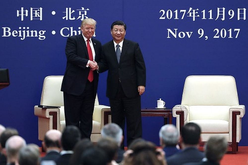 | Photo: AP : China Warns Trump's Tariffs 'Will Go Against The World'