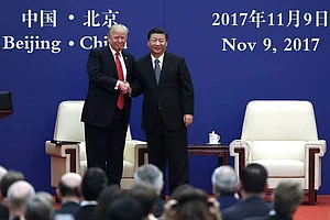 | Photo: AP : China Warns Trump's Tariffs 'Will Go Against The World'
