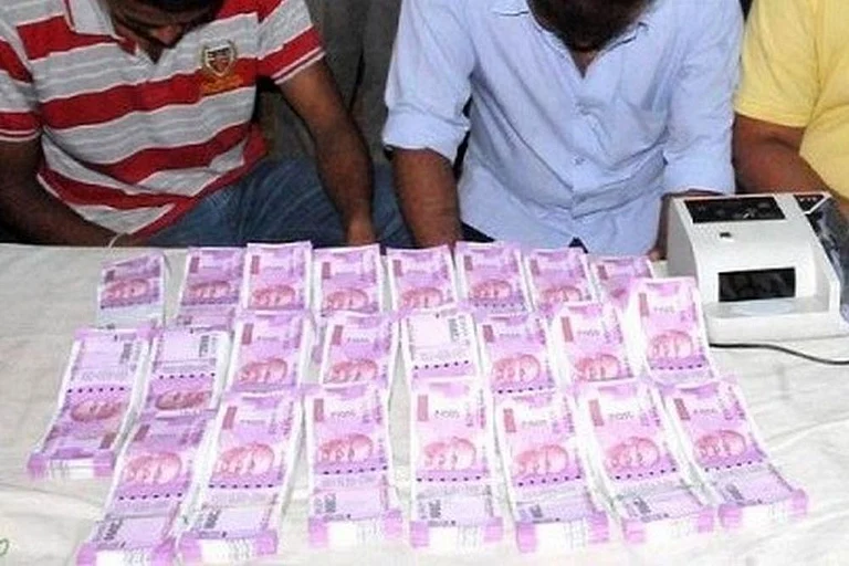 Post-demonetisation, RBI spent Rs 7,965 crore in 2016-17 on printing new Rs 500 and Rs 2,000. - null