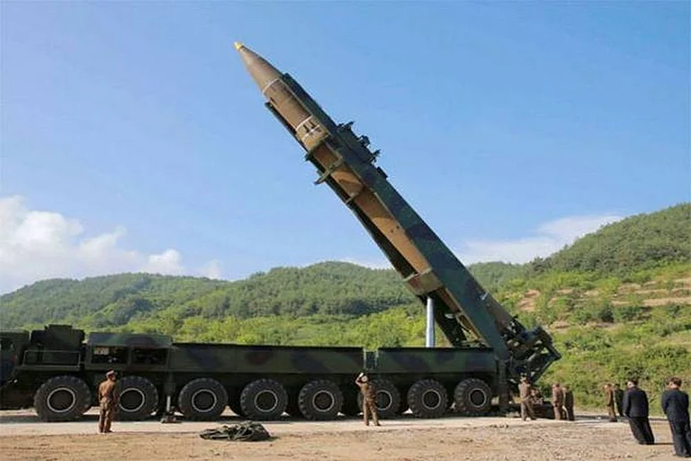 North Korea tests missiles from new nuclear warship - null
