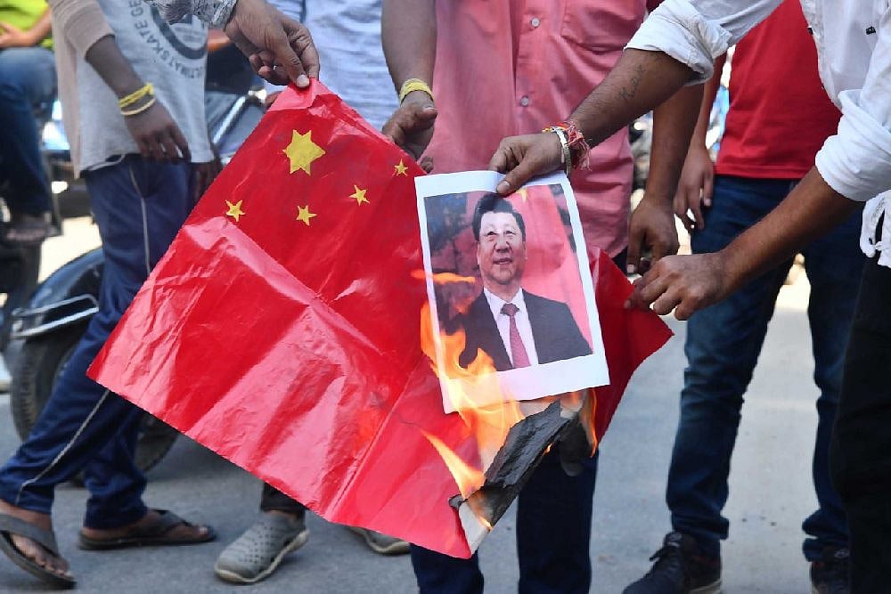 Chinese Flags Burnt In Guwahati As Xi Jinping Arrives In India