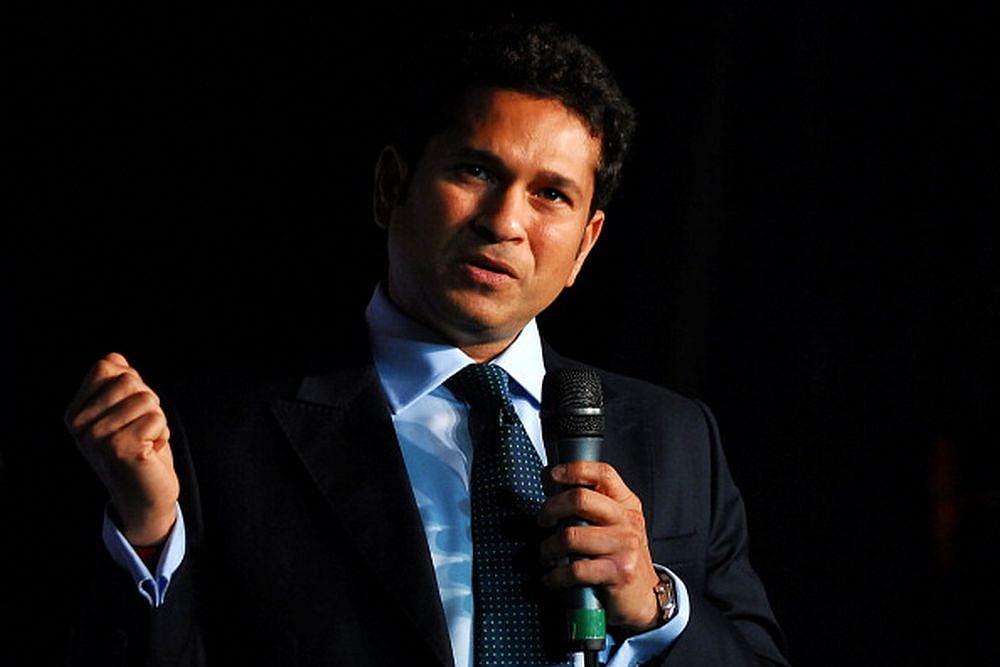 Tendulkar urged fans and critics to continue backing Indian players despite World Cup defeat.
