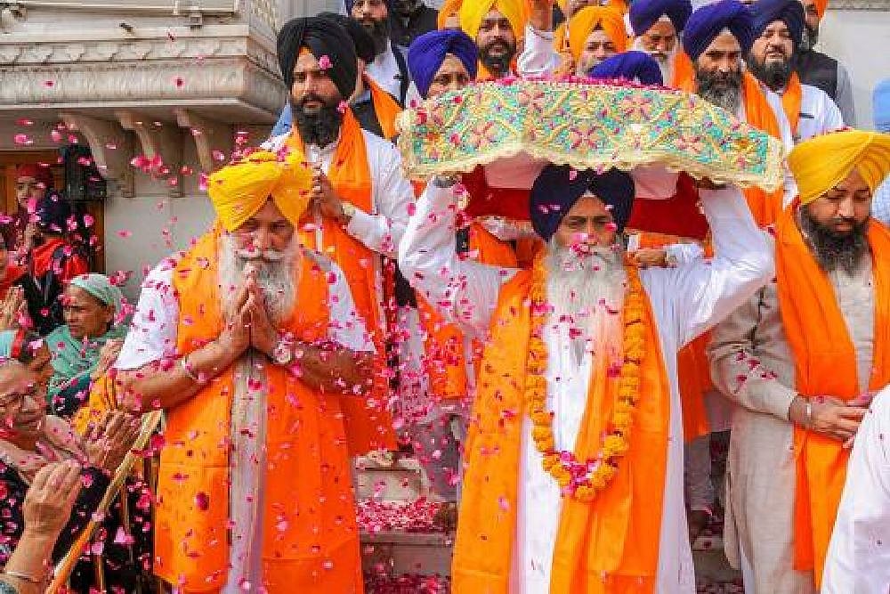 Devotees Throng Golden Temple On 550th Birth Anniversary Of Guru Nanak Dev