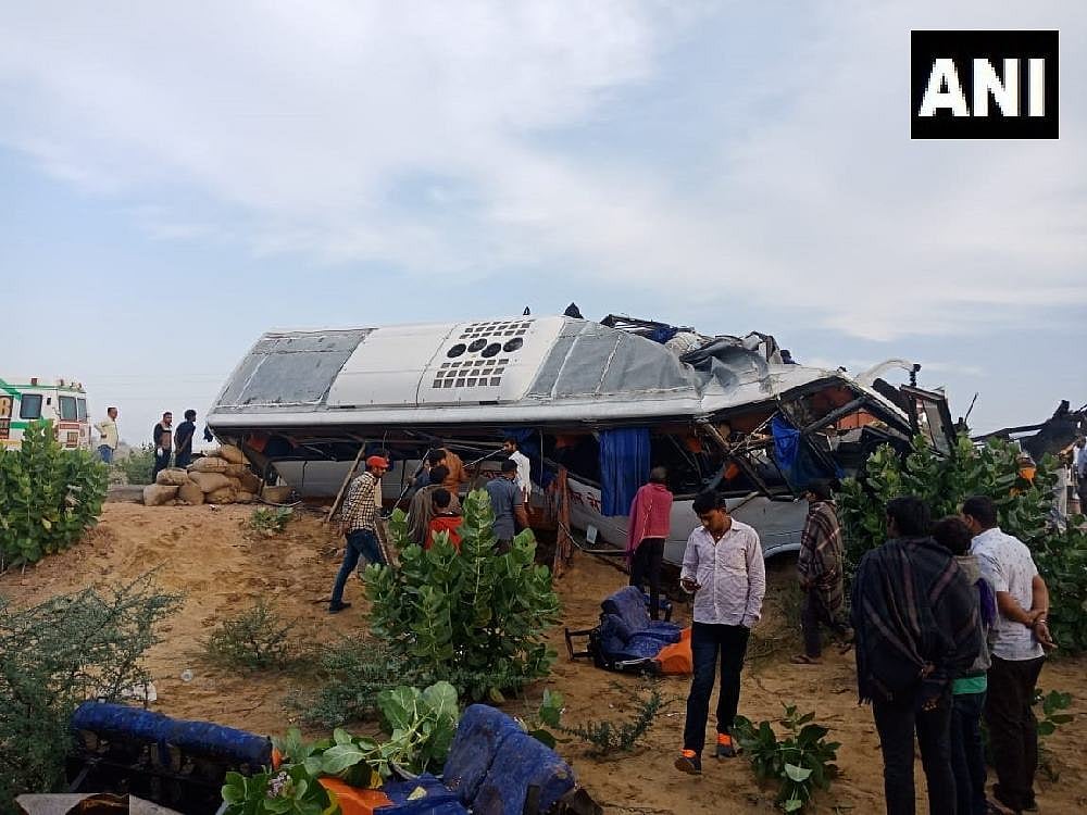 The wreckage of the bus that collided with a speeding truck in Bikaner district of Rajasthan