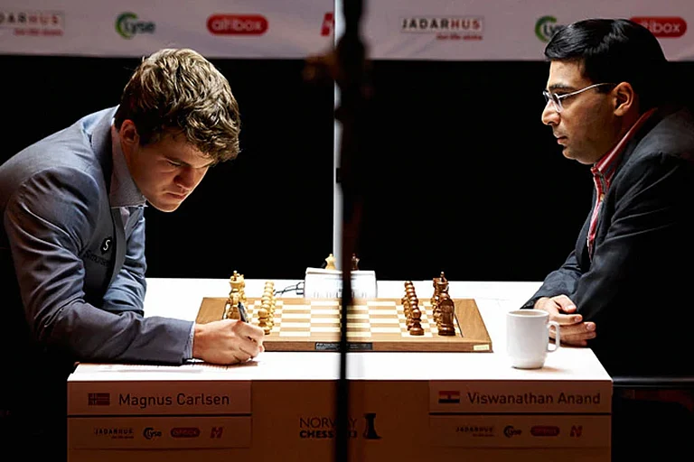 Magnus Carlsen and Viswanathan Anand. - File