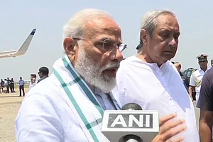 PM Narendra Modi with Odisha CM Naveen Patnaik during aerial survey of Cyclone Fani-damaged Odisha, in Bhubaneswar.