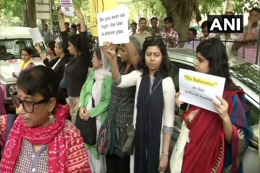 Women lawyers and activists held a protest outside the Supreme Court against the procedure adopted to deal with sexual harassment case against CJI Ranjan Gogoi. 
