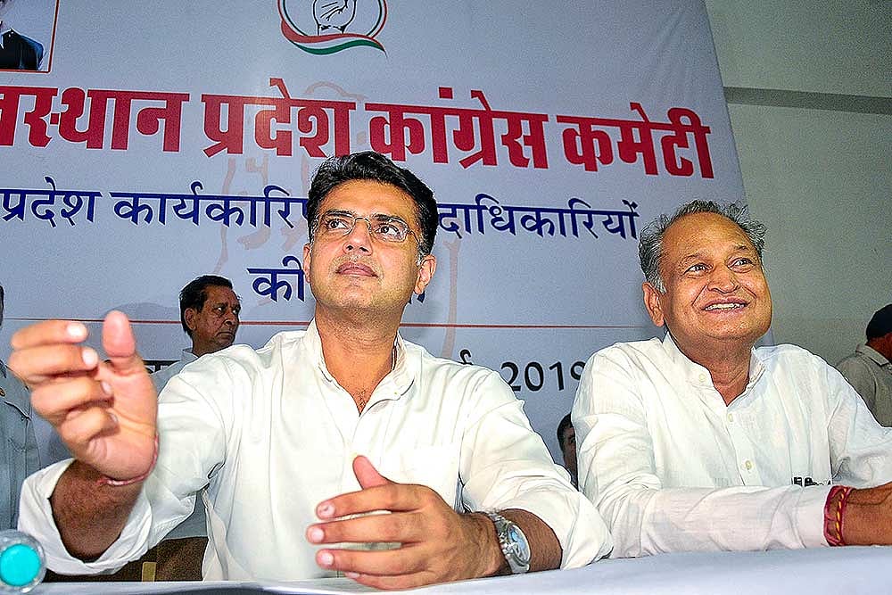 Rajasthan Chief Minister Ashok Gehlot and State Congress chief & Dy CM Sachin Pilot during a party committee meeting at the party office in Jaipur. (PTI Photo)