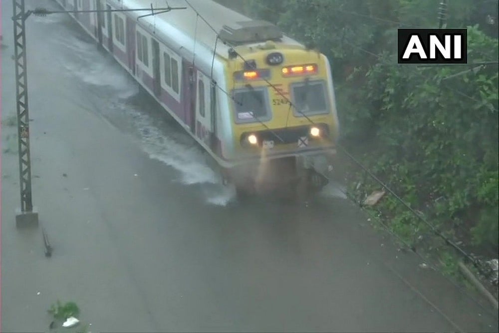 Mumbai Rains :Railways Tracks Submerged, Trains Rescheduled Due To Heavy Downpour