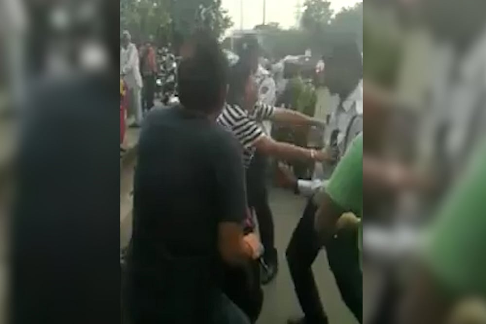Watch: Delhi Woman, Stopped For Riding Without Helmet, Clashes With Cops