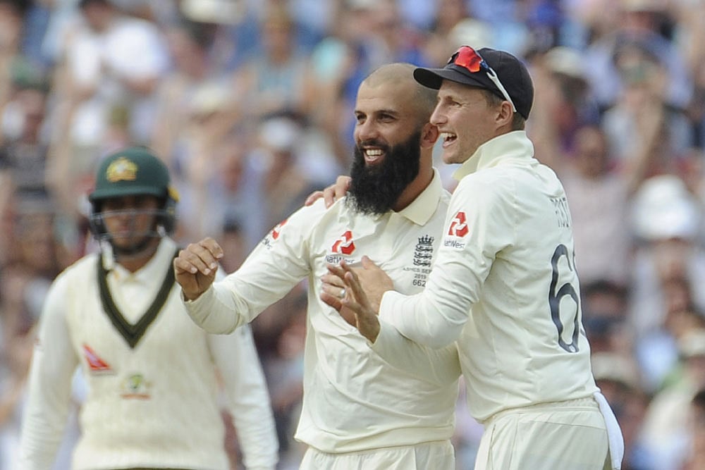 Moeen Ali (second right) has confirmed his retirement from Test cricket.