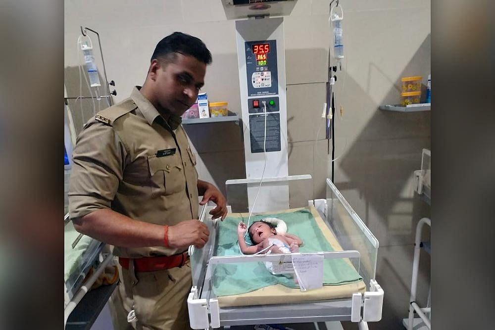 Uttar Pradesh Police Rescue Newborn Dumped In Drain