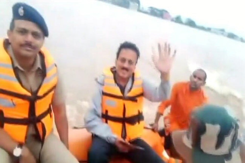 Maharashtra Minister Quotes Controversy For Taking Selfie During Flood Survey