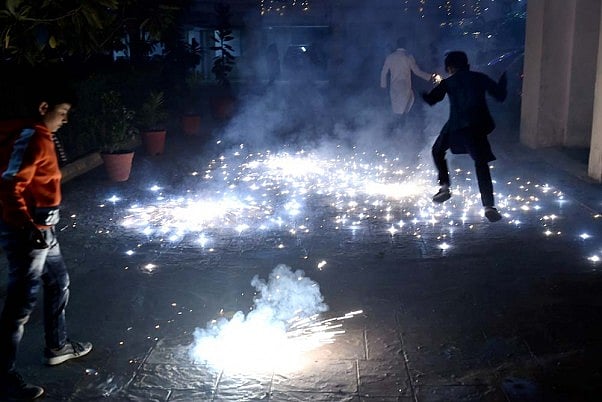 People bursting firecrackers