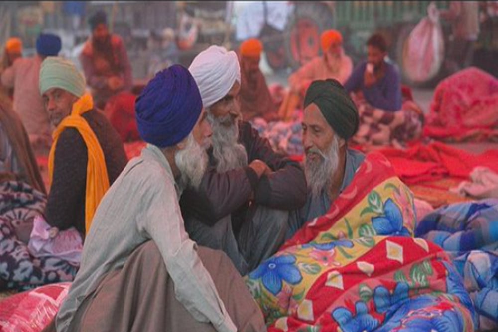 UP Man Gives Away Free Sweaters To Keep Protesting Farmers Warm In Delhi Winter