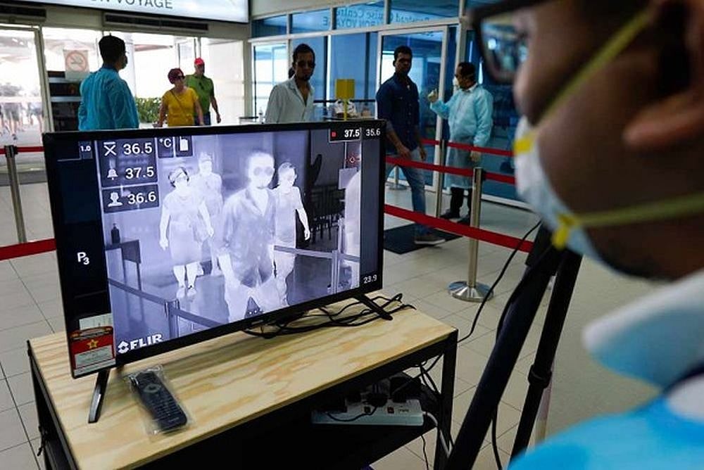 Workers return to Malaysia.