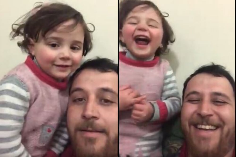 To Distract 4-Year-Old Daughter, This Syrian Father Teaches Her To Laugh Every Time A Bomb Drops