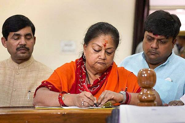 File photo of BJP leader Vasundhara Raje, accompanied by BJP MP Dushyant Singh 